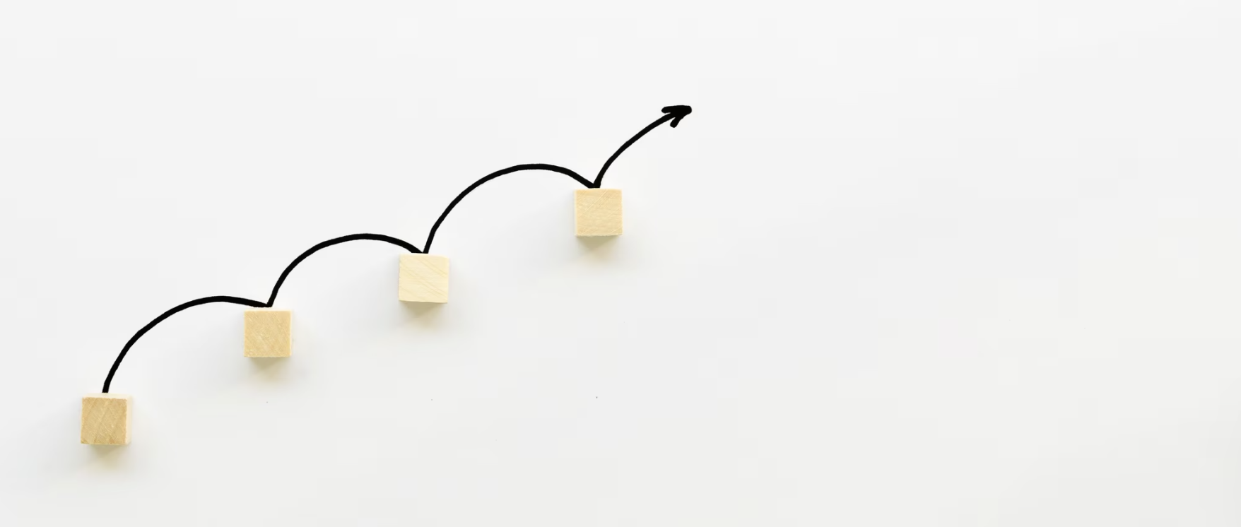 A sequence of steps and an upward arrow, representing sustained progress.